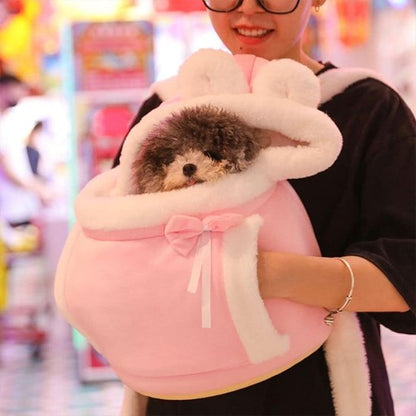 chien dans sac a dos pour chien rose portage frontal