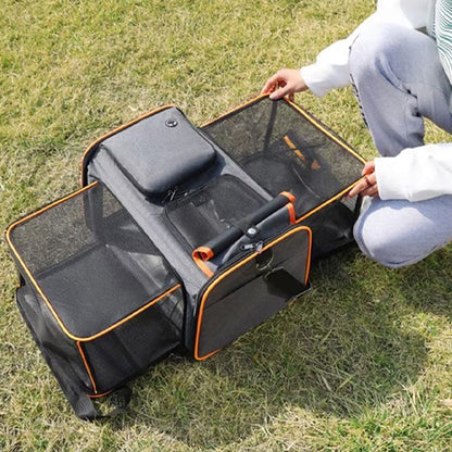 sac pour transport chien orange extensible sur herbe